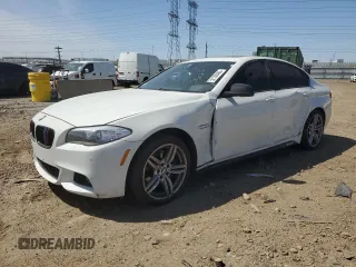 2013 BMW 5 Series 550i xDrive with VIN WBAFU9C52DDY71651, listed as a Copart auction lot 52156465 with 144,211 mi miles and Salvage title. Bid and sale history available at DreamBid. Image 1.