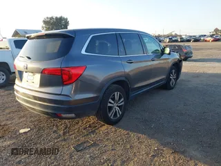 2017 Honda Pilot EX-L with VIN 5FNYF5H74HB010026, listed as a IAAI auction lot 41633770 with 170,383 mi miles and . Bid and sale history available at DreamBid. Image 4.