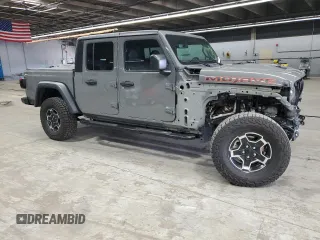 2023 Jeep Gladiator Mojave with VIN 1C6JJTEG0PL538805, listed as a Copart auction lot 53803475 with 11,645 mi miles and Salvage title. Bid and sale history available at DreamBid. Image 4.