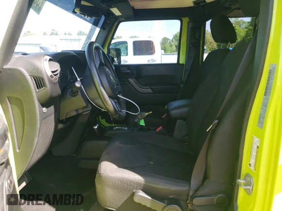 2016 Jeep Wrangler Unlimited Sport with VIN 1C4BJWDG8GL335001, listed as a Copart auction lot 53081785 with 91,533 mi miles and Salvage Title. Bid and sale history available at DreamBid. Image 7.