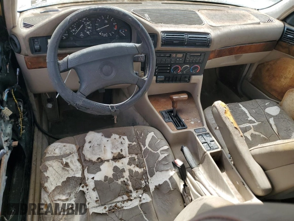 1994 BMW 5 Series 525i z VIN WBAHD632XRGK40231, wystawiony jako Copart lot #59364145 z przebiegiem Nie podano mil oraz Czysty tytuł • Clean title. Historia ofert i sprzedaży dostępna na DreamBid. Obrazek 8.