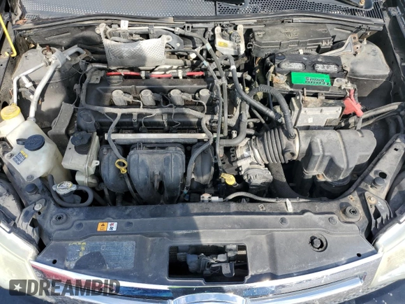 2009 Ford Focus SES with VIN 1FAHP36NX9W254950, listed as a Copart auction lot 70338674 with 197,107 mi miles and Salvage Title. Bid and sale history available at DreamBid. Image 11.