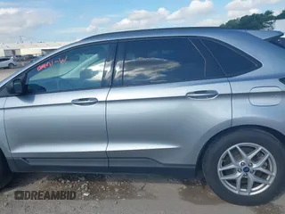 2022 Ford Edge SE with VIN 2FMPK4G92NBA75370, listed as a IAAI auction lot 42575208 with 48,678 mi miles and . Bid and sale history available at DreamBid. Image 14.