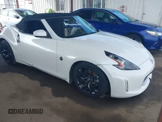2019 Nissan 370Z Touring with VIN JN1AZ4FH2KM620085, listed as a IAAI auction lot 41533662 with 57,580 mi miles and . Bid and sale history available at DreamBid. Image 1.