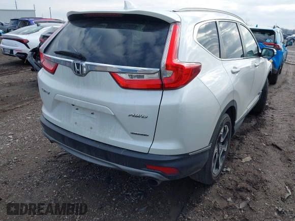 2017 Honda CR-V Touring with VIN 5J6RW2H92HL040217, listed as a IAAI auction lot 41044193 with 180,842 mi miles. Bid and sale history available at carsss.com. Image 4.