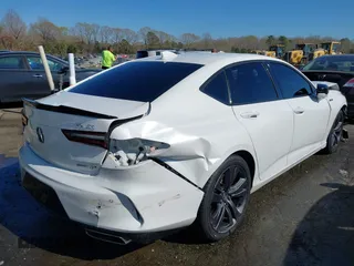 2022 Acura TLX w/A-Spec Package with VIN 19UUB6F52NA002062, listed as a IAAI auction lot 41853469 with 77,301 mi miles and . Bid and sale history available at DreamBid. Image 4.