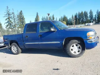 2004 GMC Sierra 1500 Crew Cab SLE with VIN 2GTEK13TX41394077, listed as a IAAI auction lot 42047304 with 227,296 mi miles. Bid and sale history available at carsss.com. Image 13.