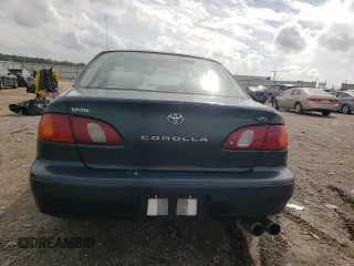 1999 Toyota Corolla VE with VIN 2T1BR12E8XC255511, listed as a Copart auction lot 55388585 with 81,645 mi miles and Salvage title. Bid and sale history available at DreamBid. Image 6.