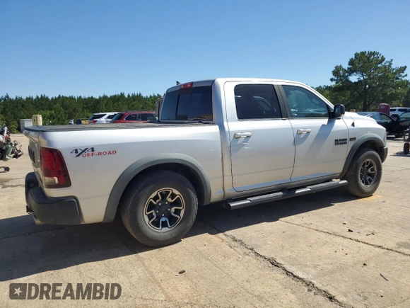 2017 Ram 1500 Rebel z VIN 1C6RR7YT4HS531035, wystawiony jako Copart lot #57652345 z przebiegiem 130 013 mil mil oraz Czysty tytuł • Clean title. Historia ofert i sprzedaży dostępna na DreamBid. Obrazek 3.