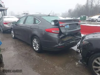 2017 Ford Fusion Energi SE with VIN 3FA6P0PU6HR203037, listed as a IAAI auction lot 41567334 with 96,852 mi miles. Bid and sale history available at carsss.com. Image 3.