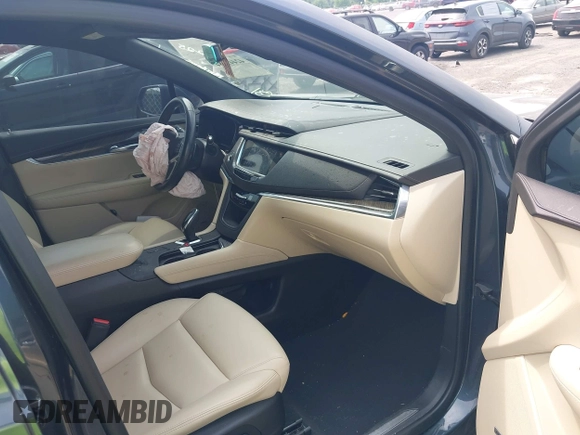 2019 Cadillac XT5 FWD with VIN 1GYKNARS6KZ176080, listed as a IAAI auction lot 42441084 with 46,931 mi miles and . Bid and sale history available at DreamBid. Image 5.