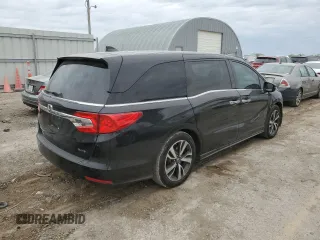 2018 Honda Odyssey Elite with VIN 5FNRL6H92JB024856, listed as a Copart auction lot 52409895 with 123,264 mi miles and Salvage title. Bid and sale history available at DreamBid. Image 3.