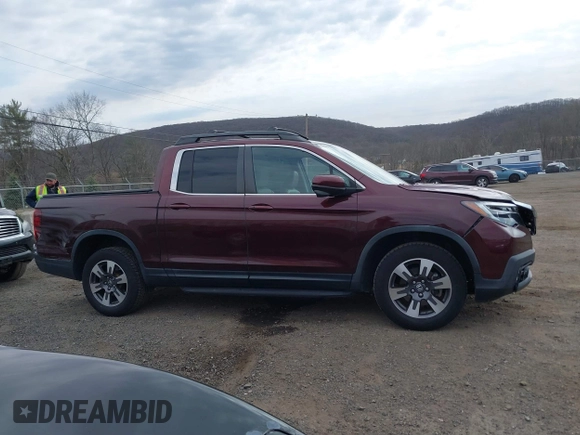 2018 Honda Ridgeline RTL-T with VIN 5FPYK3F69JB010983, listed as a IAAI auction lot 41781716 with 45,494 mi miles and . Bid and sale history available at DreamBid. Image 13.