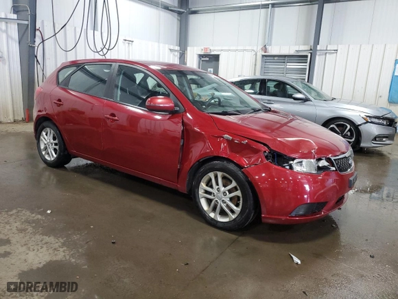 2011 Kia Forte 5-Door EX with VIN KNAFU5A25B5328125, listed as a Copart auction lot 56281874 with 125,052 mi miles and Salvage Title. Bid and sale history available at carsss.com. Image 4.