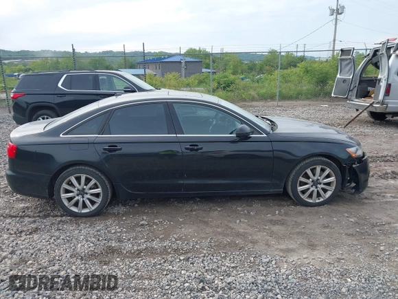 2014 Audi A6 Premium Plus z VIN WAUGFAFCXEN065126, wystawiony jako IAAI lot #42333403 z przebiegiem 121 467 mil mil oraz . Historia ofert i sprzedaży dostępna na DreamBid. Obrazek 13.