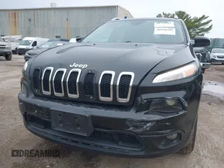 2014 Jeep Cherokee Latitude z VIN 1C4PJMCS5EW219542, wystawiony jako IAAI lot #40950309 z przebiegiem 154 099 mil mil oraz . Historia ofert i sprzedaży dostępna na DreamBid. Obrazek 6.