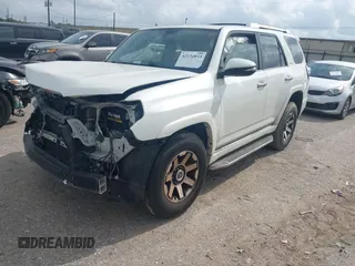2014 Toyota 4Runner SR5 with VIN JTEZU5JR7E5080554, listed as a IAAI auction lot 42134833 with 170,077 mi miles and . Bid and sale history available at DreamBid. Image 18.