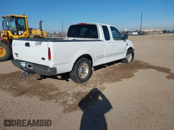 1998 Ford F-150 with VIN 1FTZX17W3WKB43668, listed as a IAAI auction lot 41243322 with 154,780 mi miles and . Bid and sale history available at DreamBid. Image 4.