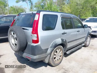 2005 Honda CR-V LX with VIN JHLRD78525C040139, listed as a IAAI auction lot 42097811 with 306,718 mi miles. Bid and sale history available at carsss.com. Image 4.