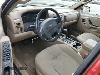2002 Jeep Grand Cherokee with VIN 1J8GX38S92C176329, listed as a Copart auction lot 47885635 with 154,167 mi miles and Salvage title. Bid and sale history available at DreamBid. Image 8.