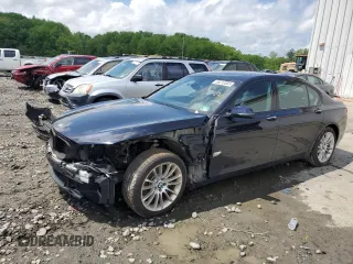 2014 BMW 7 Series ALPINA B7 xDrive with VIN WBAYF8C5XED653245, listed as a Copart auction lot 56010085 with 114,519 mi miles and Salvage title. Bid and sale history available at DreamBid. Image 1.