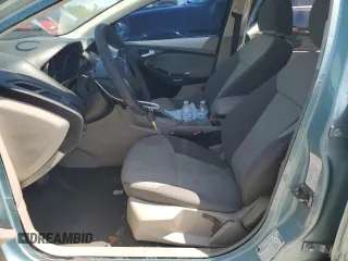 2012 Ford Focus SE with VIN 1FAHP3F29CL428201, listed as a Copart auction lot 52566905 with 209,909 mi miles and Salvage title. Bid and sale history available at DreamBid. Image 7.