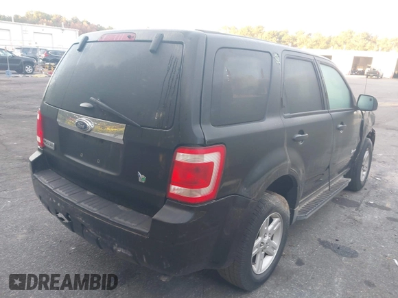 2011 Ford Escape Hybrid with VIN 1FMCU4K3XBKB04742, listed as a IAAI auction lot 40557688 with 258,767 mi miles and . Bid and sale history available at DreamBid. Image 4.