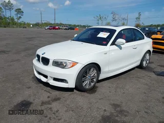2013 BMW 1 Series 128i with VIN WBAUP7C50DVP24385, listed as a IAAI auction lot 41913737 with 46,217 mi miles and . Bid and sale history available at carsss.com. Image 2.