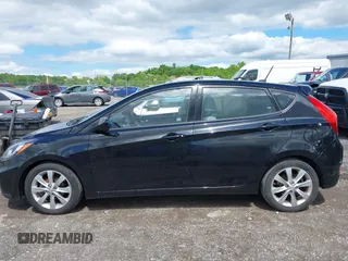 2012 Hyundai Accent SE z VIN KMHCU5AE0CU031475, wystawiony jako IAAI lot #42196146 z przebiegiem 122 489 mil mil oraz . Historia ofert i sprzedaży dostępna na DreamBid. Obrazek 14.