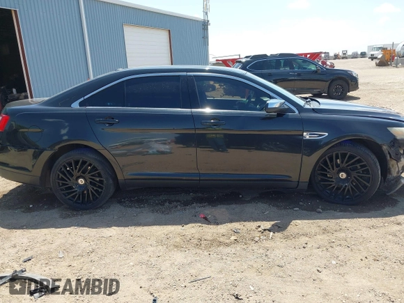 2014 Ford Taurus Limited с VIN 1FAHP2F8XEG111179, выставлен на аукционе IAAI как лот 42561945 с пробегом 191 999 миль миль и . История ставок и продаж доступна на DreamBid. Изображение 14.
