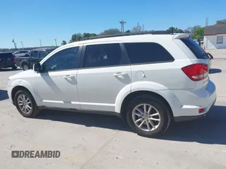 2017 Dodge Journey SXT z VIN 3C4PDCBG9HT510635, wystawiony jako IAAI lot #41590439 z przebiegiem 131 054 mil mil oraz . Historia ofert i sprzedaży dostępna na DreamBid. Obrazek 14.