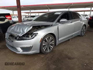 2017 Lincoln MKZ Reserve z VIN 3LN6L5E93HR603246, wystawiony jako IAAI lot #42024614 z przebiegiem 131 622 mil mil oraz . Historia ofert i sprzedaży dostępna na DreamBid. Obrazek 17.