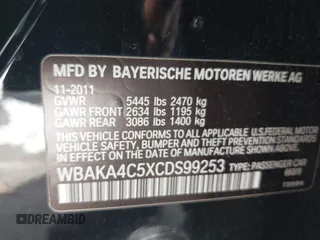 2012 BMW 7 Series 740i with VIN WBAKA4C5XCDS99253, listed as a IAAI auction lot 41710171 with 176,907 mi miles. Bid and sale history available at carsss.com. Image 9.
