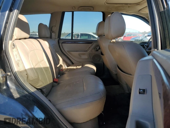 2002 Jeep Grand Cherokee Limited z VIN 1J8GW58SX2C286904, wystawiony jako Copart lot #84749214 z przebiegiem Nie podano mil oraz Czysty tytuł • Clean title. Historia ofert i sprzedaży dostępna na DreamBid. Obrazek 11.