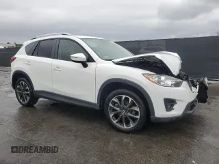 2016 Mazda CX-5 Grand Touring with VIN JM3KE2DYXG0839774, listed as a Copart auction lot 52336275 with 125,605 mi miles and Salvage Title. Bid and sale history available at carsss.com. Image 4.