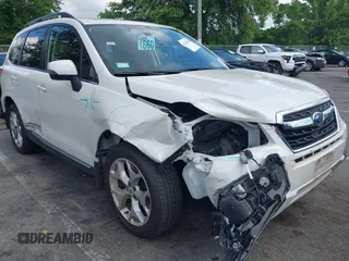 2018 Subaru Forester Touring with VIN JF2SJAWC8JH402351, listed as a IAAI auction lot 42718509 with 55,994 mi miles and . Bid and sale history available at DreamBid. Image 1.