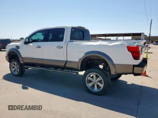 2017 Nissan Titan Pro-4X z VIN 1N6BA1F42HN575024, wystawiony jako Copart lot #52025835 z przebiegiem 23 422 mil mil oraz Czysty tytuł • Clean title. Historia ofert i sprzedaży dostępna na DreamBid. Obrazek 2.