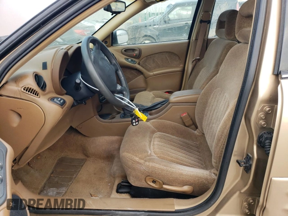 1999 Pontiac Grand Am SE2 with VIN 1G2NE52T2XM869508, listed as a Copart auction lot 44443755 with 119,769 mi miles and Salvage Title. Bid and sale history available at carsss.com. Image 7.