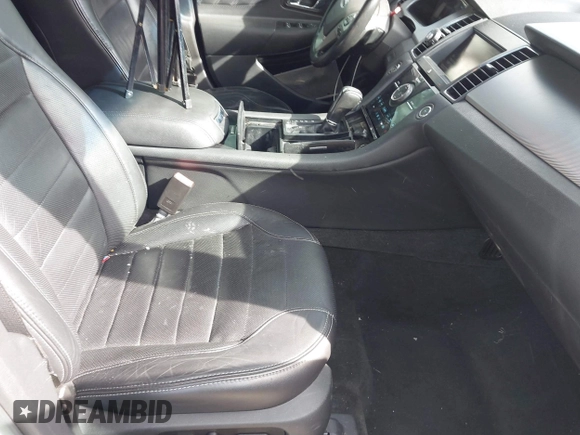 2015 Ford Taurus SHO with VIN 1FAHP2KT8FG202995, listed as a IAAI auction lot 41823964 with 79,720 mi miles and . Bid and sale history available at DreamBid. Image 5.