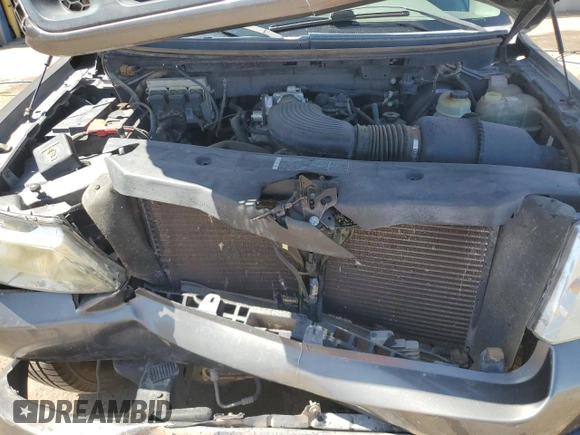 2006 Ford F-150 STX with VIN 1FTRX02W06KB84129, listed as a Copart auction lot 60349115 with 132,768 mi miles and Salvage title. Bid and sale history available at DreamBid. Image 11.