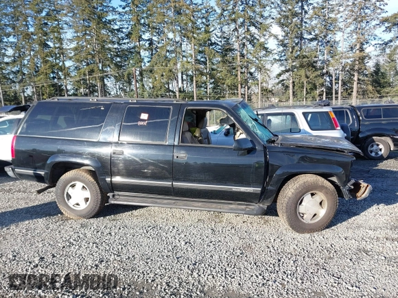 1999 GMC Suburban with VIN 3GKFK16R2XG524342, listed as a IAAI auction lot 41682292 with 161,536 mi miles and . Bid and sale history available at DreamBid. Image 13.