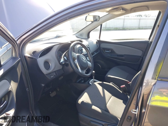 2015 Toyota Yaris L with VIN VNKKTUD34FA022251, listed as a IAAI auction lot 41435973 with 57,044 mi miles. Bid and sale history available at carsss.com. Image 5.