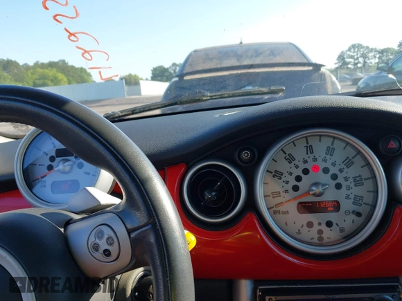 2006 MINI Hardtop S with VIN WMWRE33586TJ34762, listed as a IAAI auction lot 42255599 with 112,664 mi miles and . Bid and sale history available at DreamBid. Image 7.