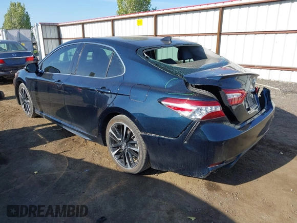2020 Toyota Camry XSE with VIN 4T1K61AK0LU320375, listed as a IAAI auction lot 42126158 with 99,470 mi miles and . Bid and sale history available at DreamBid. Image 3.