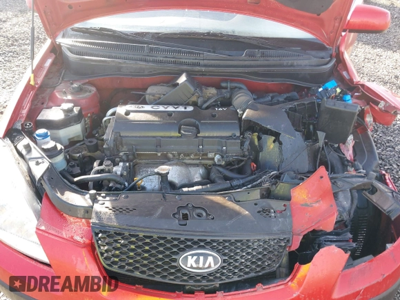2009 Kia Rio LX with VIN KNADE223796485606, listed as a IAAI auction lot 41676881 with 58,852 mi miles and . Bid and sale history available at DreamBid. Image 10.