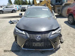 2019 Lexus UX 250h with VIN JTHU9JBH2K2013001, listed as a Copart auction lot 59142205 with 104,917 mi miles and Salvage title. Bid and sale history available at DreamBid. Image 5.
