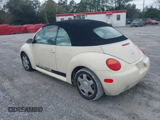 2004 Volkswagen Beetle with VIN 3VWCM21Y64M306721, listed as a IAAI auction lot 41611494 with 183,434 mi miles and . Bid and sale history available at DreamBid. Image 3.