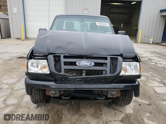 2011 Ford Ranger XLT with VIN 1FTLR4FEXBPA28847, listed as a Copart auction lot 49305335 with 99,034 mi miles and Salvage title. Bid and sale history available at DreamBid. Image 5.
