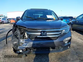 2016 Honda Pilot EX-L z VIN 5FNYF5H54GB041614, wystawiony jako IAAI lot #41505898 z przebiegiem Nie podano mil oraz . Historia ofert i sprzedaży dostępna na DreamBid. Obrazek 11.
