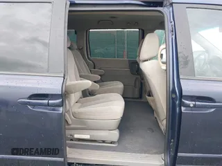 2009 Kia Sedona LX with VIN KNDMB233696278019, listed as a IAAI auction lot 41983960 with 153,083 mi miles. Bid and sale history available at carsss.com. Image 8.